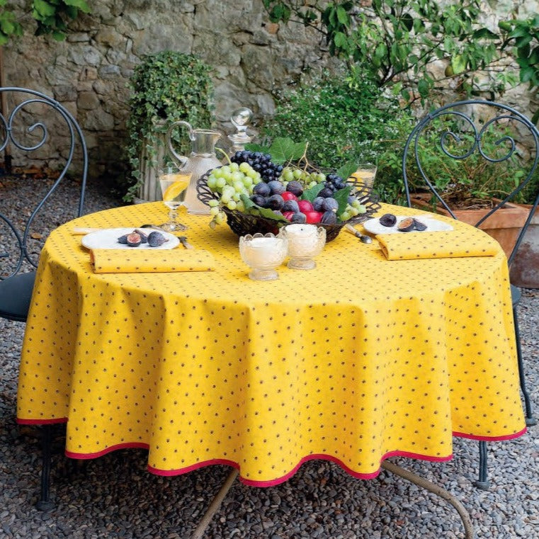 a-place-for-all-your-needs-to-shop-tissus-toselli-calisson-rouge-jaune-red-yellow-all-over-french-provence-coated-cotton-tablecloth-60-round-online-sale_7.jpg